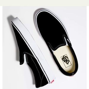 Vans black slip on in good used condition